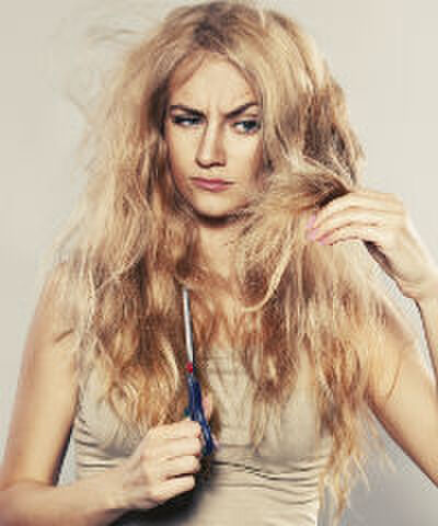 Gespleten haarpunten: hier komt het door (en zo kom je er weer vanaf)