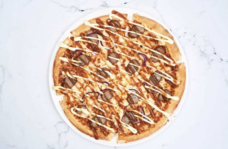 Smullen: Domino&rsquo;s komt met pizza met curryworst speciaal smaak