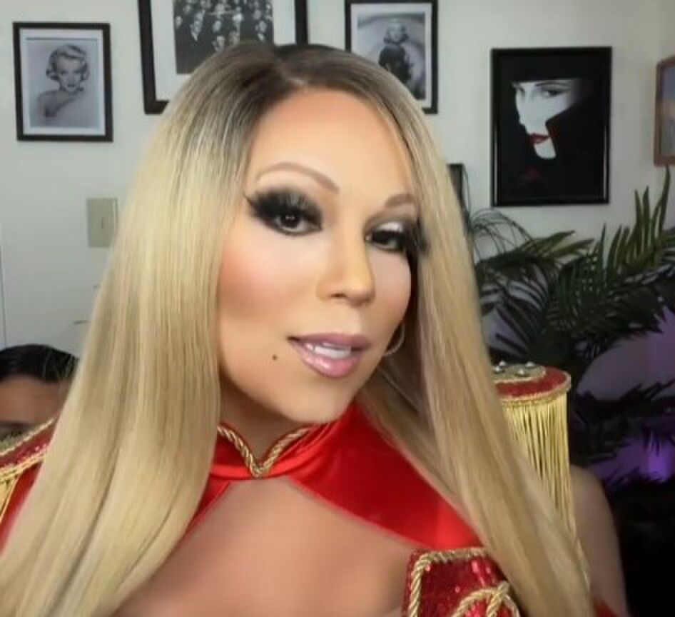 Wow! Deze man lijkt echt belachelijk veel op Mariah Carey