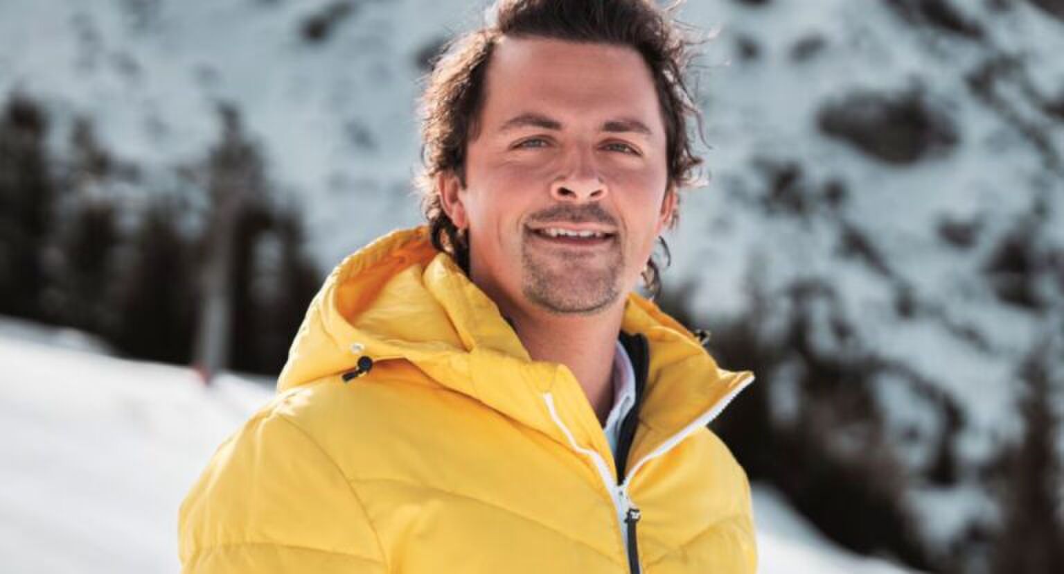 Mike Hansler poseert voor een foto.