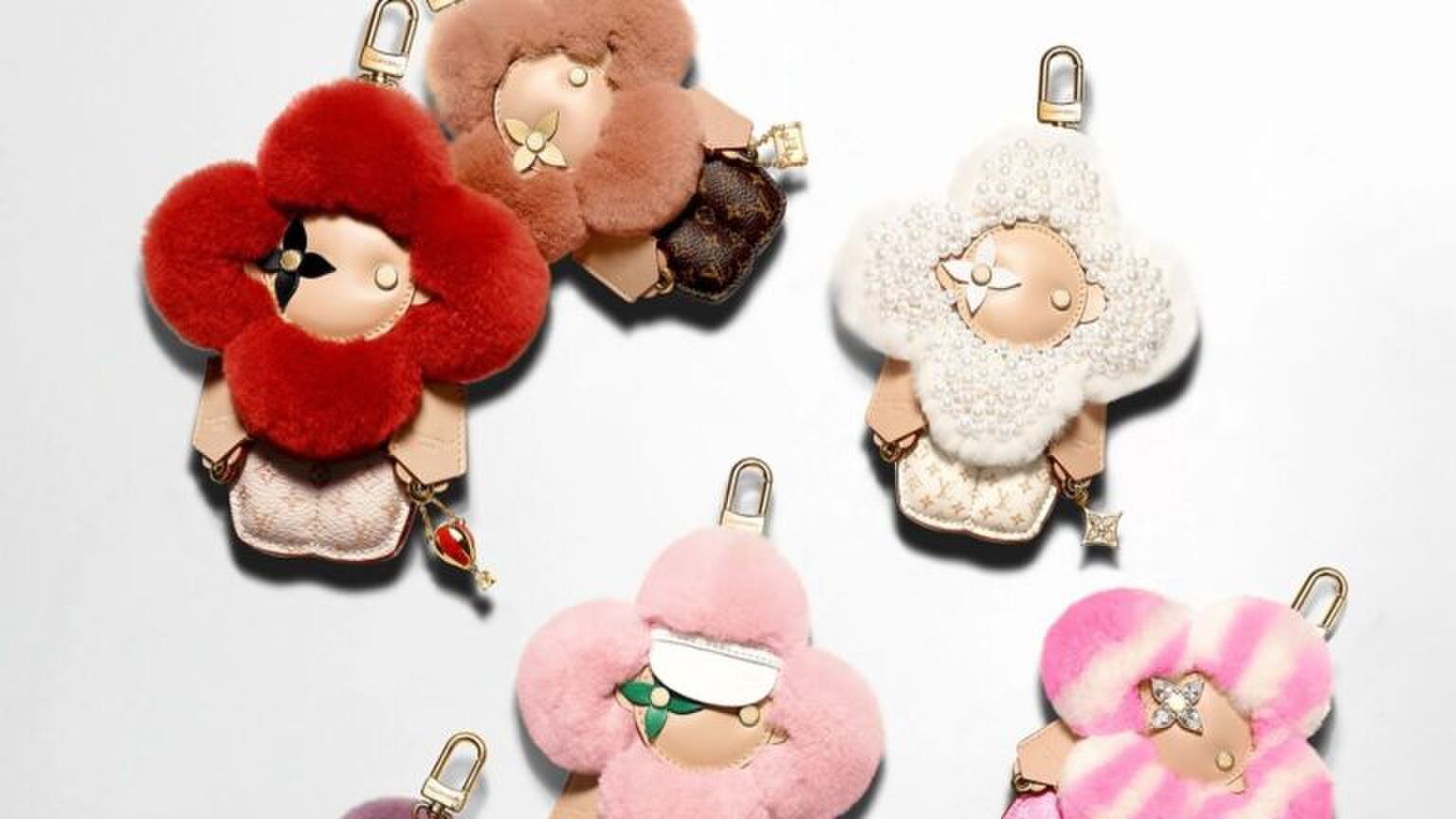 Louis Vuitton charms.