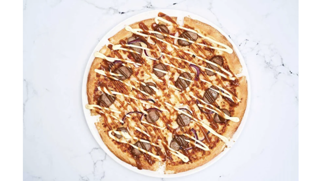 Illustratie voor: Smullen: Domino’s komt met pizza met curryworst speciaal smaak