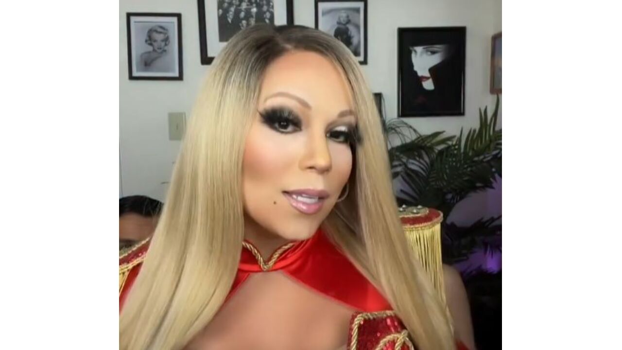 Illustratie voor: Wow! Deze man lijkt echt belachelijk veel op Mariah Carey