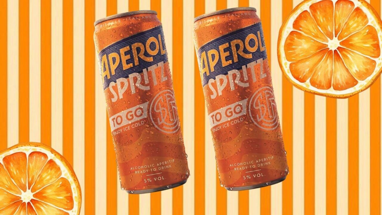 Aperol-blikjes met sinaasappel.