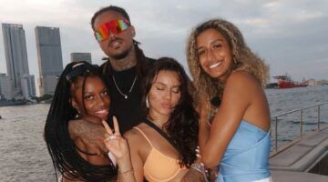Shaniqua en Quentin knuffelen met andere castleden van EOTB.