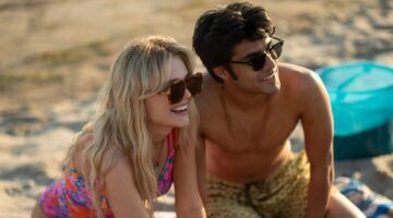 Scène uit We Were Liars waar Cadence en Gat op het strand zitten.