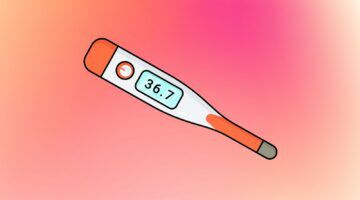 Een thermometer met een kleurijke achtergrond.