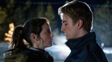 Vrouw en man kijken naar elkaar. De vrouw kijkt geschokkeerd.