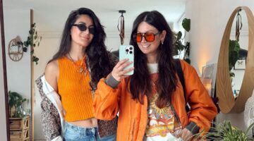 Twee meiden in een outfit voor Koningsdag.