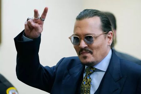 Illustratie voor: Johnny Depp wint rechtszaak tegen Amber Heard: ‘Een nieuw hoofdstuk kan beginnen’