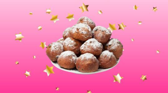 Schaal oliebollen met sterretjes op de achtergrond.