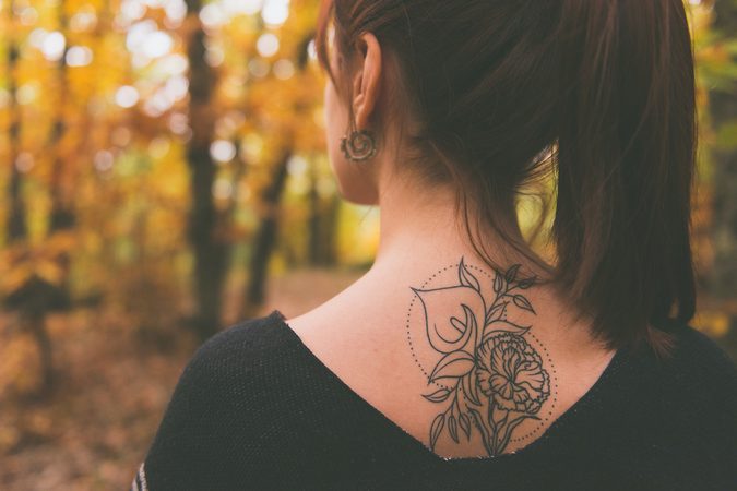 19x inspiratie: de mooiste tattoos voor op je bovenrug / nek