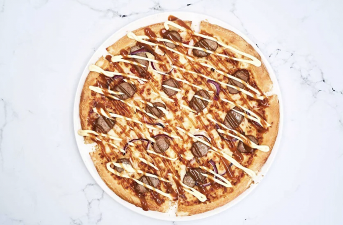Smullen: Domino&rsquo;s komt met pizza met curryworst speciaal smaak