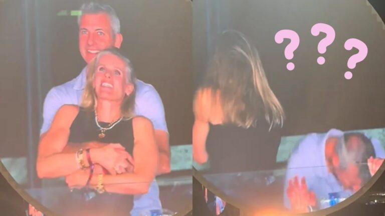 koppel tijdens coldplay concert duikt weg voor camera