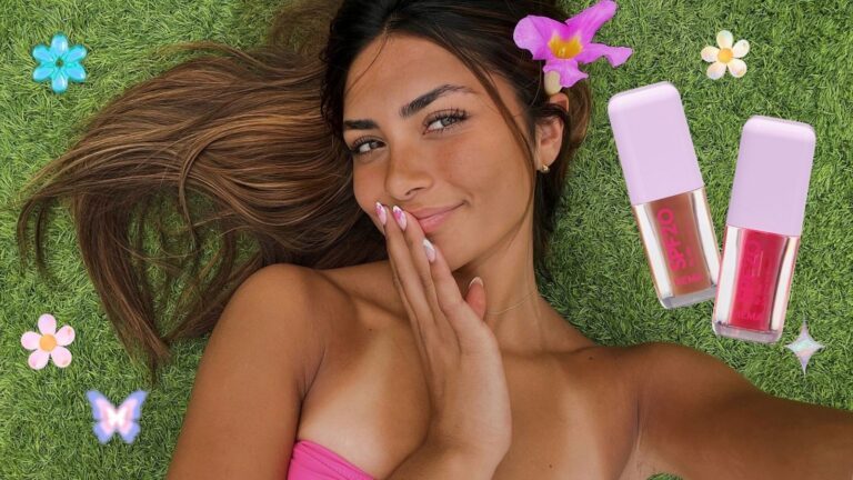 Meisje ligt naast de lipolie met spf van HEMA.