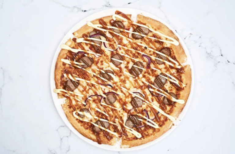 Smullen: Domino&rsquo;s komt met pizza met curryworst speciaal smaak