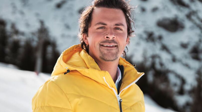 Mike Hansler poseert voor een foto.