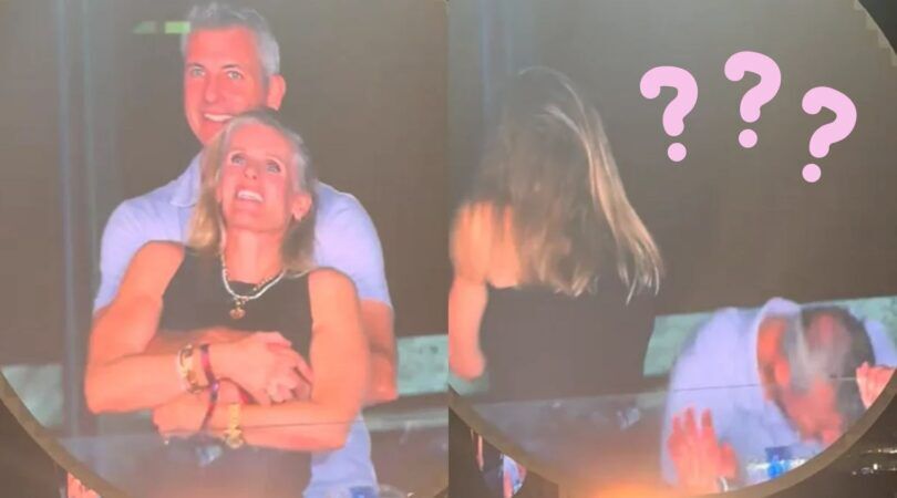 koppel tijdens coldplay concert duikt weg voor camera