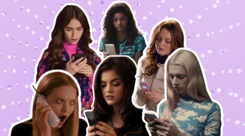 Vrouwen kijken verbaasd naar hun telefoon.