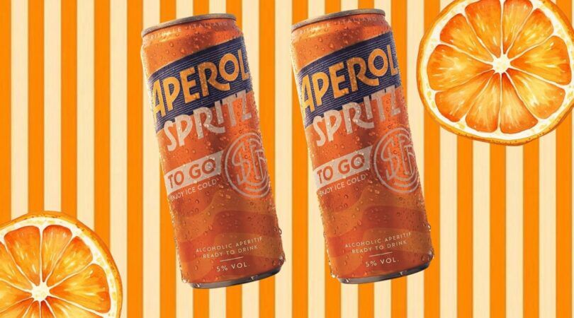 Aperol-blikjes met sinaasappel.