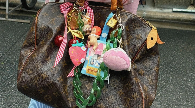 tas met bag charms